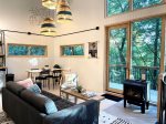 Livingroom offers tons of windows for natural light